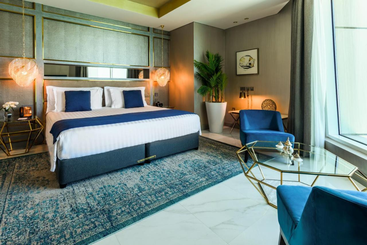 Centara West Bay Hotel & Residences Доха Экстерьер фото Deluxe Room