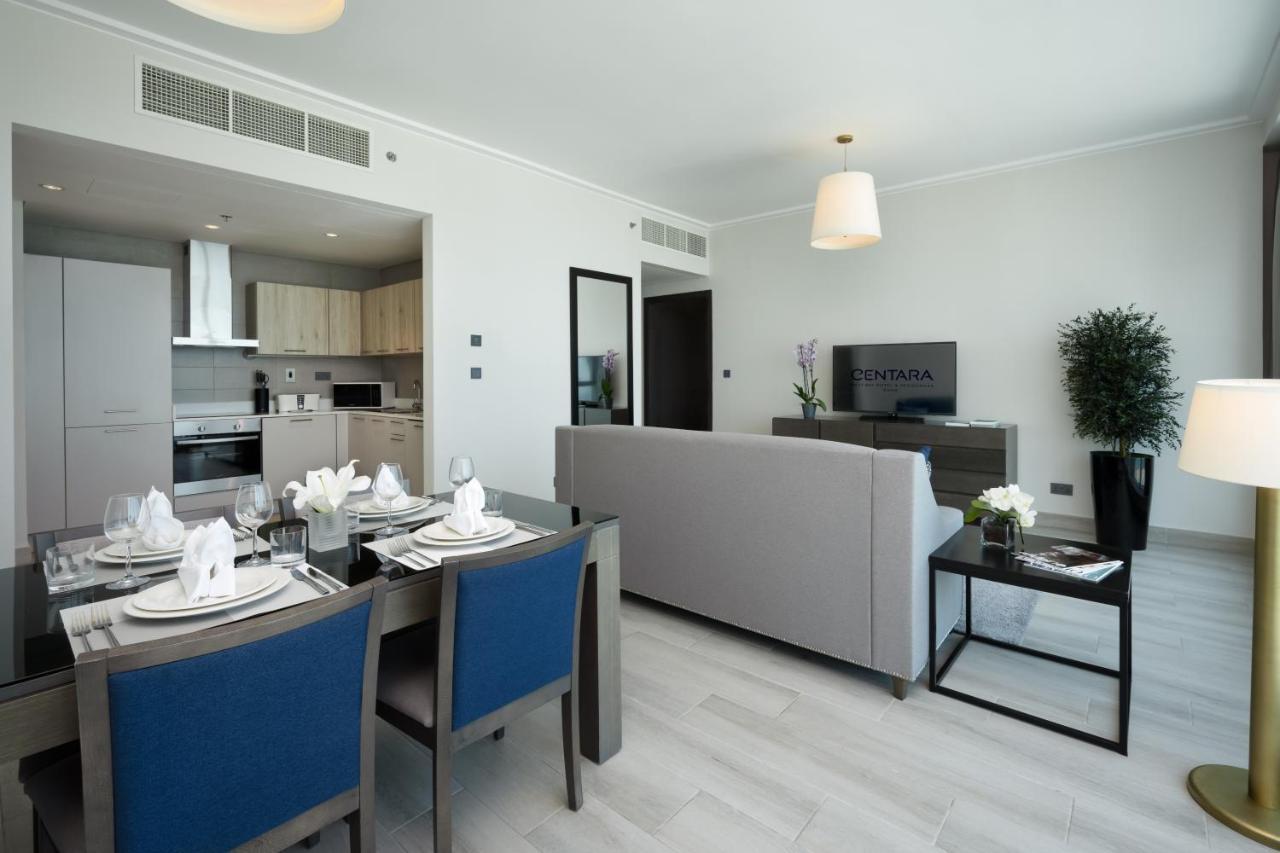 Centara West Bay Hotel & Residences Доха Экстерьер фото A living room at the hotel