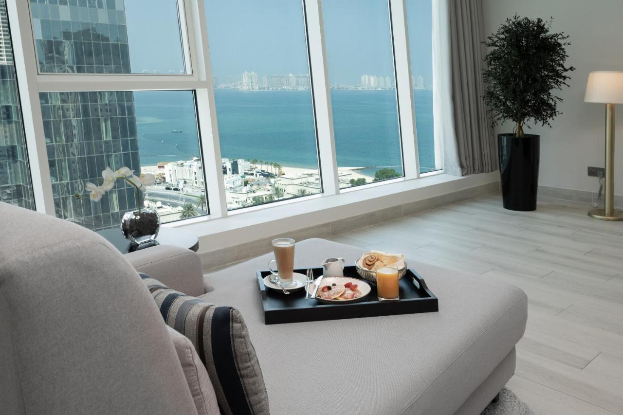 Centara West Bay Hotel & Residences Доха Экстерьер фото A view from a suite at the Ritz-Carlton, DIFC