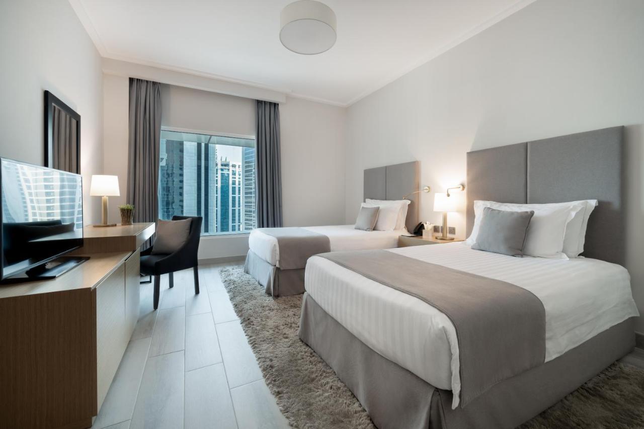 Centara West Bay Hotel & Residences Доха Экстерьер фото A typical guest room at the hotel