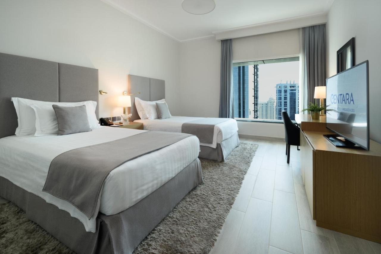 Centara West Bay Hotel & Residences Доха Экстерьер фото A room at the hotel
