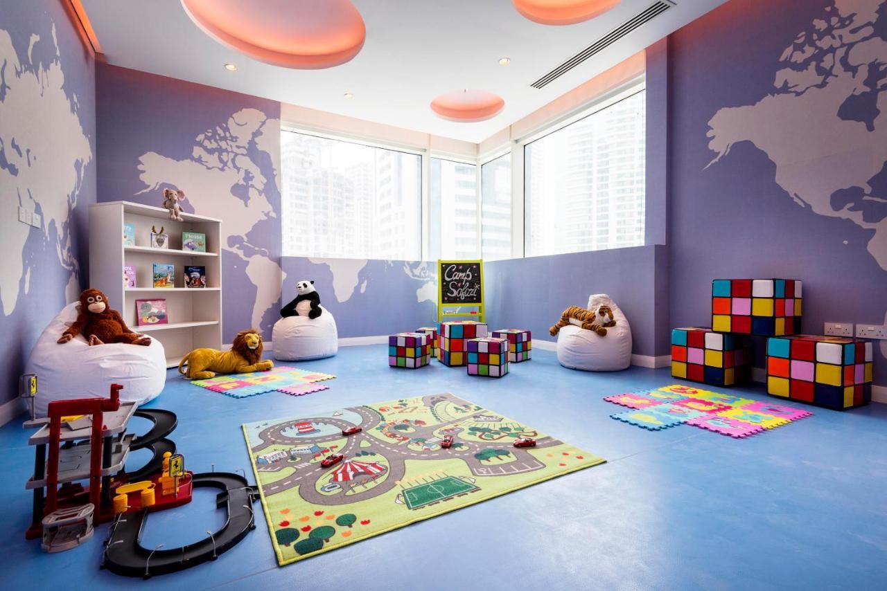 Centara West Bay Hotel & Residences Доха Экстерьер фото The Children's Room
